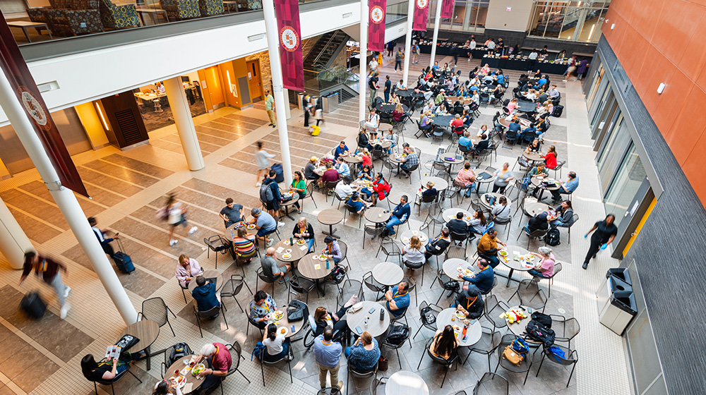 An aerial view of the Damen Student Center where Loyola students are eating, conversing, and studying